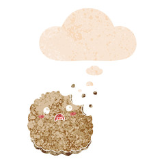 cartoon biscuit and thought bubble in retro textured style