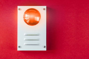 Fire safety system on a red background of a copy space