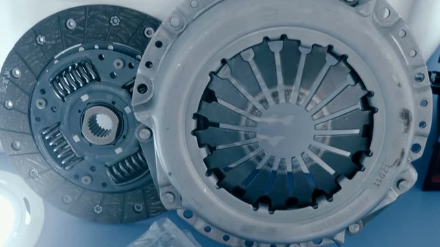 New car clutch basket and disc is show in the exhibition. Shot in motion