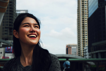 Beautiful Asia sport woman smile portrait at outdoor.