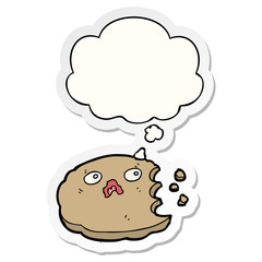 cartoon cookie and thought bubble as a printed sticker