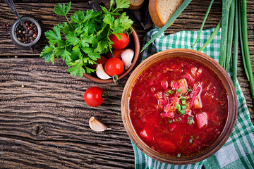 Traditional Ukrainian Russian borscht or red soup in the  bowl. Top view