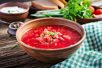 Traditional Ukrainian Russian borscht or red soup in the  bowl.