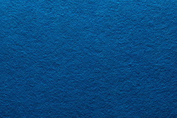 Sea blue felt texture abstract art background. Colored fabric fibers surface. Empty space.