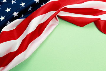 American flag on green  background  top view