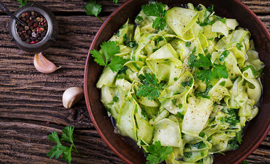 Salad of marinated zucchini in spices. Vegan food. Healthy meal. Top view