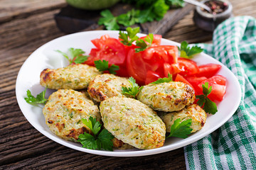 Chicken cutlet with zucchini and tomatoes salad. Healthy food.