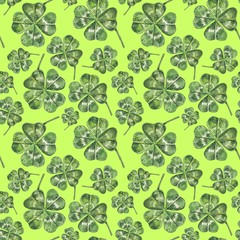 Beautiful seamless background with flowers and clover leaves using ladybugs and field herbs. Good luck symbols. Can be used as a background template for Wallpaper, printing on fabrics, etc.