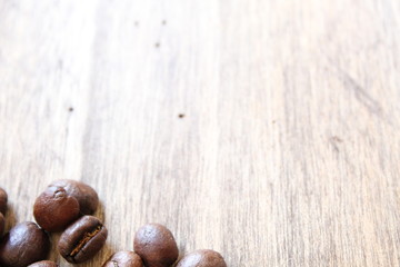 coffee beans on wooden background