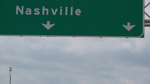 Direction sign to Nashville on the freeway - travel photography