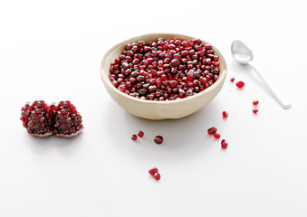 Pomegranate on a plate. 3d rendered illustration 