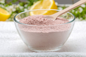 Cosmetic clay. Pink cosmetic clay in different types on a white wooden table. face mask and body....