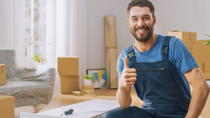 Successful Furniture Assembly Worker Finishes Assembling Shelf and Shows Thumbs Up Smilingly....