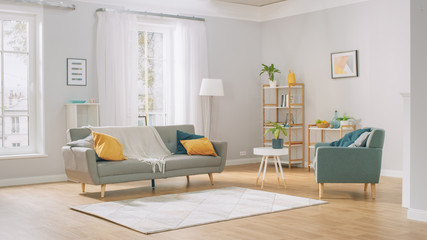 Shot of a Bright Cozy Modern Apartment with Big Windows, Decorations and Stylish Furniture.