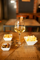 White wine aperitivo chips olives 