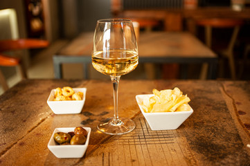 White wine aperitivo chips olives 