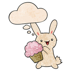 cute cartoon rabbit with muffin and thought bubble in grunge texture pattern style