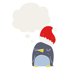 cute christmas penguin and thought bubble in retro style