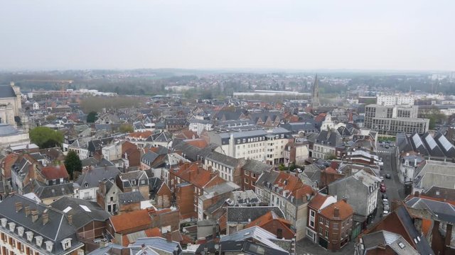 View on the rooftops of the city of Arras, in the north of France. Filmed from the belfry, in cloudy weather. Arras is located in the Hauts-de-France region.