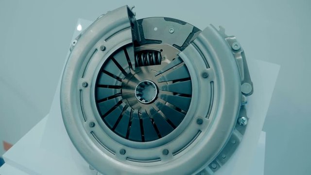 New car clutch basket and disc is show in the exhibition. Shot in motion