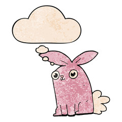 cartoon bunny rabbit and thought bubble in grunge texture pattern style