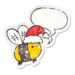 cute cartoon bee wearing christmas hat and speech bubble distressed sticker
