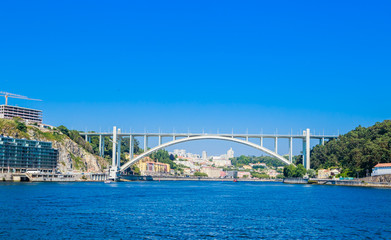 Arrabida Bridge in Porto Portugal, crossing the Douro River and linking Porto with Vila Nova de Gaia