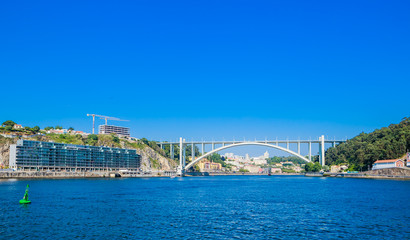 Arrabida Bridge in Porto Portugal, crossing the Douro River and linking Porto with Vila Nova de Gaia