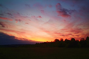 colorful sunset in the countryside in autumn, Russia.