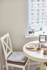 Kitchen Area. Wooden table and chair. Interior details