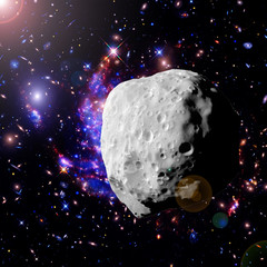Asteroid flying in the deep space. Elements of this image furnished by NASA.
