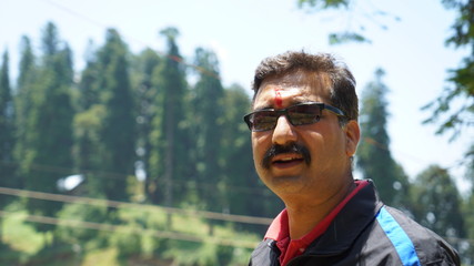 portrait of young man in sunglasses
