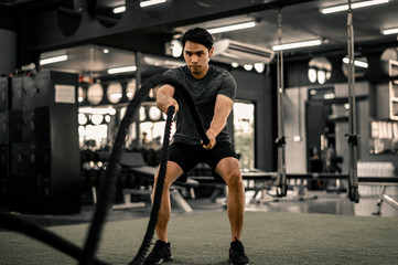 Fit young man workout in a gym