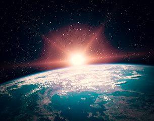 Fototapeta premium Sunflare and the earth from space. The elements of this image furnished by NASA.