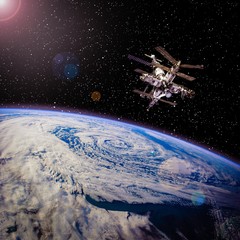 Earth and spaceship. Space station on orbite of earth. The eleme