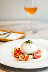 Artigiana Burrata Salad Herb marinated burrata, French cured pork shoulder and salad