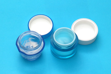 Face moisturisers creams inside glass jars