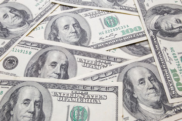 Texture of dollar bills. One hundred dollars.