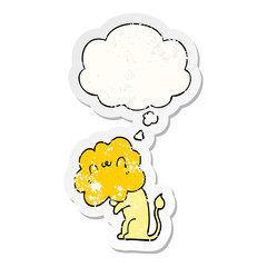 cartoon lion and thought bubble as a distressed worn sticker