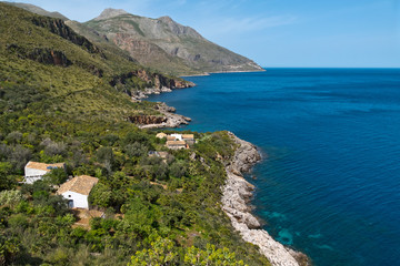 Naklejka na ściany i meble A panoramic view of the coastline of the Oasi dello Zingaro natural reserve, San Vito Lo Capo, Sicily