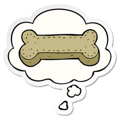 cartoon dog biscuit and thought bubble as a printed sticker