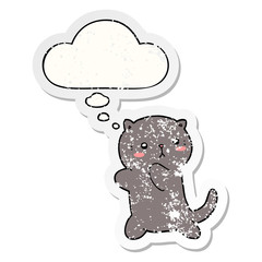 cute cartoon cat and thought bubble as a distressed worn sticker