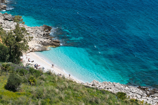 Oasi dello Zingaro natural reserve, San Vito Lo Capo, Sicily - April 4, 2018: tourist at the paradise beach of Cala dell'Uzzo