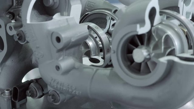 Structure of new automotive turbines to increase engine power is presented for review at the exhibition. Shot in motion