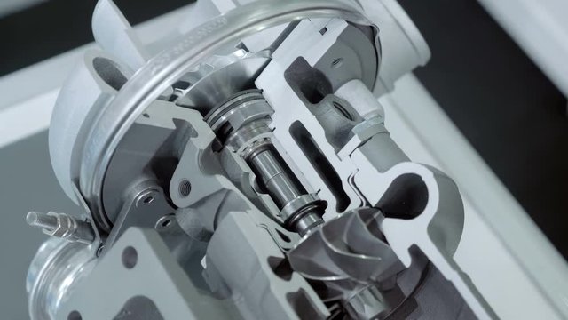 Structure of new automotive turbines to increase engine power is presented for review at the exhibition. Shot in motion