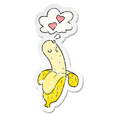 cartoon banana in love and thought bubble as a distressed worn sticker