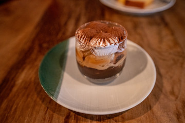 Banoffee pie with bananas, whipped cream, chocolate, coffee and toffee