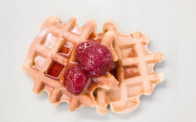 Viennese waffles with strawberry jam topping