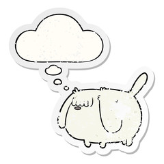 funny cartoon dog and thought bubble as a distressed worn sticker