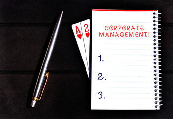 Conceptual hand writing showing Corporate Management. Concept meaning all Levels of Managerial Personnel and Excutives Writing equipments placed next to a gadget vintage lantern